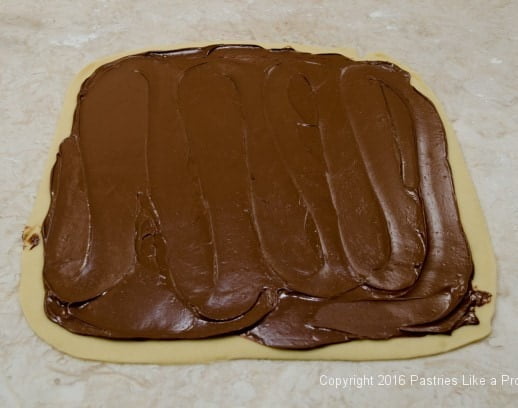 Nutella spread on dough for the Chocolate Babka