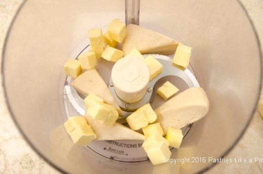 Butter and dough in processor