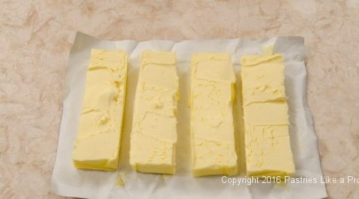 Butter cut in quarters for Kouign Amann