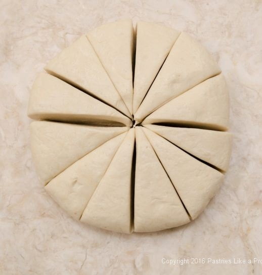 Dough cut into 12 pieces for Kouign Amann