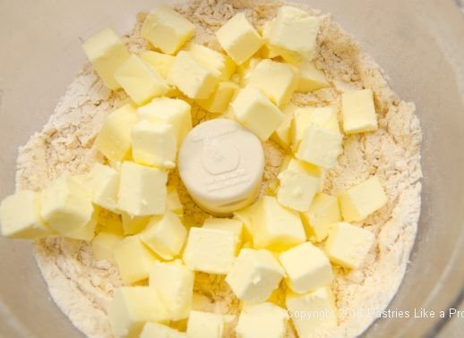 Butter in processor for the Cheddar Pecan Shortbreads