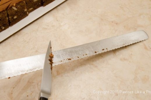Cleaning the knife between cuts for the Honey Diamonds