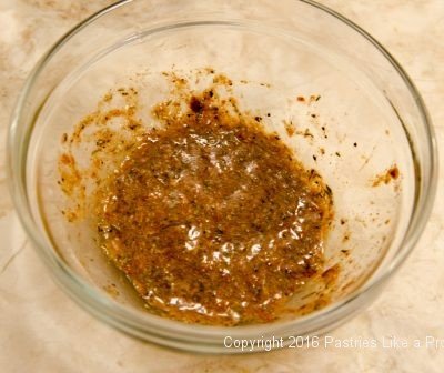 Spices and liquids mixed for Hot Peppered Pecans