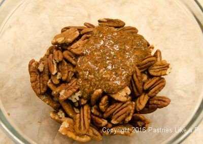 Spices on pecans for the Hot Peppered Pecans