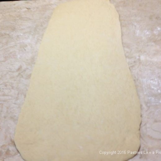 Dough rolled our for Stuffed Italian Bread