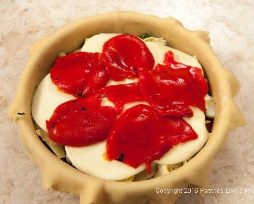 Second layer of red peppers for the Torta Rustica