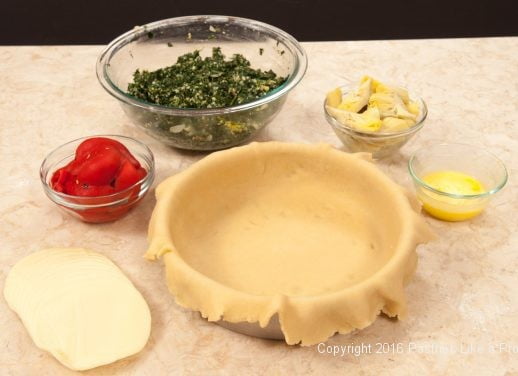 Pasta Frolla with filling ingredients for the Torta Rustica