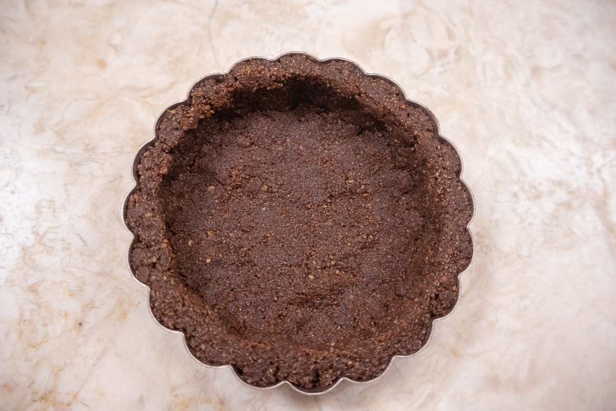 The bottom crust has been pressed in and the  tart shell is completed and ready for the filling.