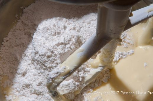 Flour added to batter for Easily Made Raspberry Ripple Coffeecake