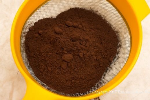 Sifting cocoa for Cocoa Fundamentals Natural vs. Dutched