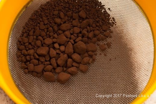 Sifting cocoa for Cocoa Fundamentals Natural vs. Dutched