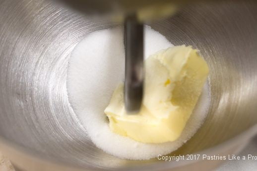 Butter and sugar in a bowl for Chocolate Raspberry Marzipan Gateau