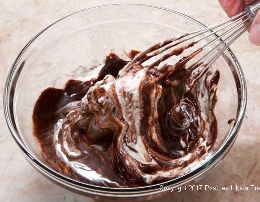 Folding cream into chocolate for the Double Chocolate No Machine Ice Cream