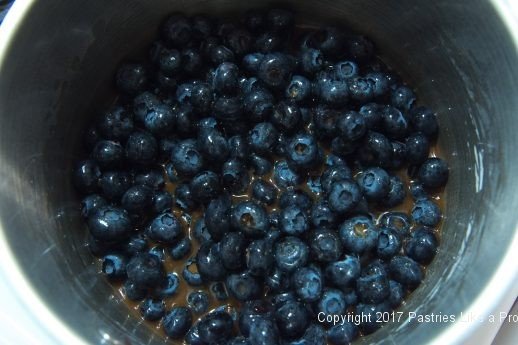 Blueberries added to the pan for the Streusel Topped Blueberry Cobbler