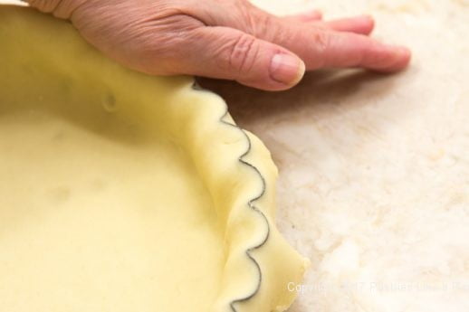 Pressing dough off for the Caramel Apple Tart