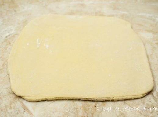 Puff pastry rolled into 9" square for Pithiviers made with Blitz Puff Pastry