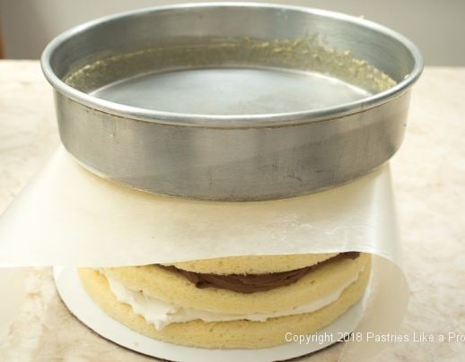 Pan on top of cake layers for Raspberries and Cream Cake