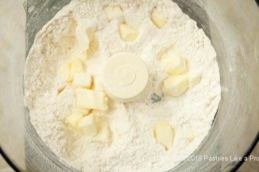 Butter added to processor forPeach Jam