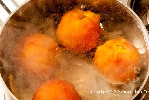 Boiling peaches for Everything Peaches