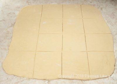 Dough cut into squares for Plum Dumplings