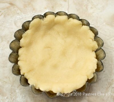 Dough in tart pan for Browned Butter Tarts