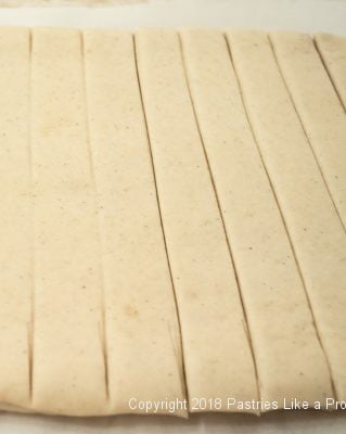 Cardamom Yeast Rolls cut into strips