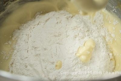 Flour added to the batter for the individual Variegated Pound Cakes