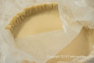 Removing paper from pastry in shell