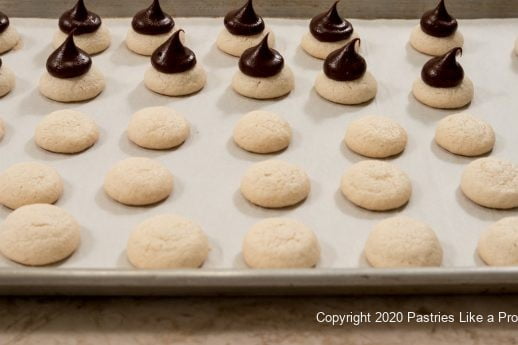 Piped and unpiped macaroons for Sarah Bernhardts