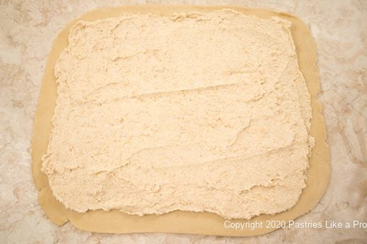 Filling spread on dough