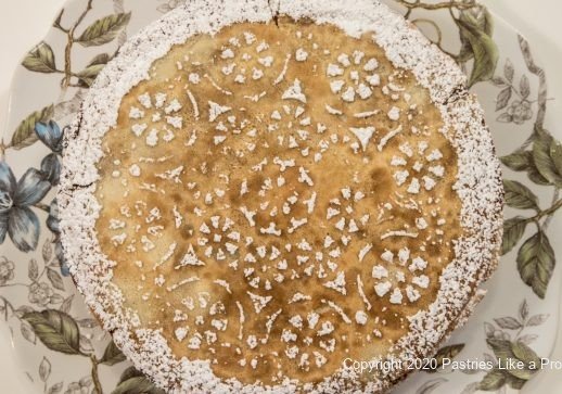 Powdered sugar on Cafe au Lait cake