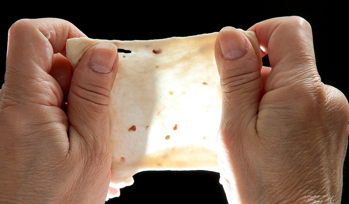 Stretched dough forming a winddowpane