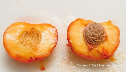 Peach cut in half