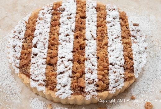 Caramelized Peach tart with powdered sugar