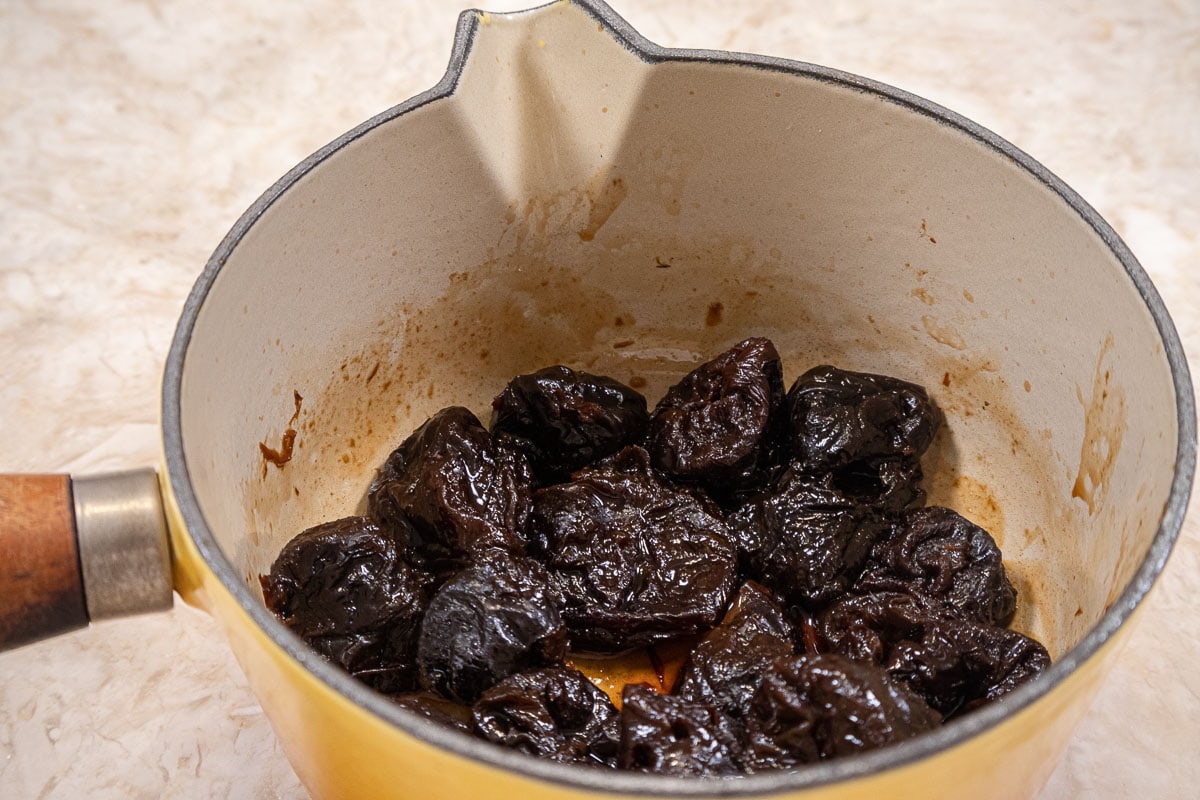The prunes are cooked until just a little liquid is left in the pan