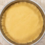 The top crust in place over the filling for the Gateau Breton