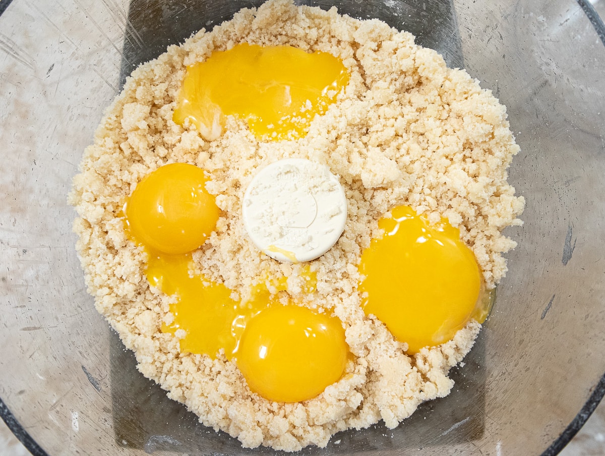 Five egg yolks in the processor