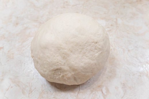 Ball of dough kneaded for Stuffed Focaccia