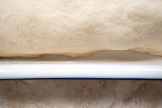 Top dough tucked under bottom dough