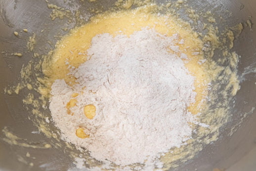 Add half the flour
