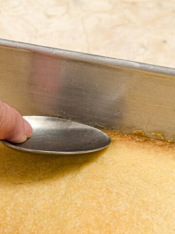 Sealing the Crust to the side of the pan