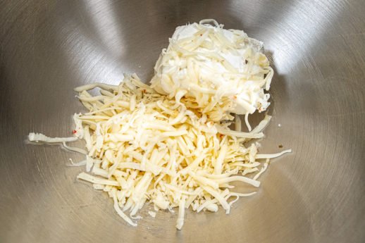 Pepperjack and cream cheese in mixing bowl
