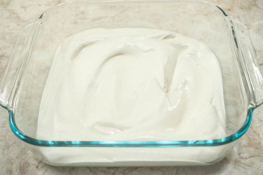 Bottom layer of ice cream in pan