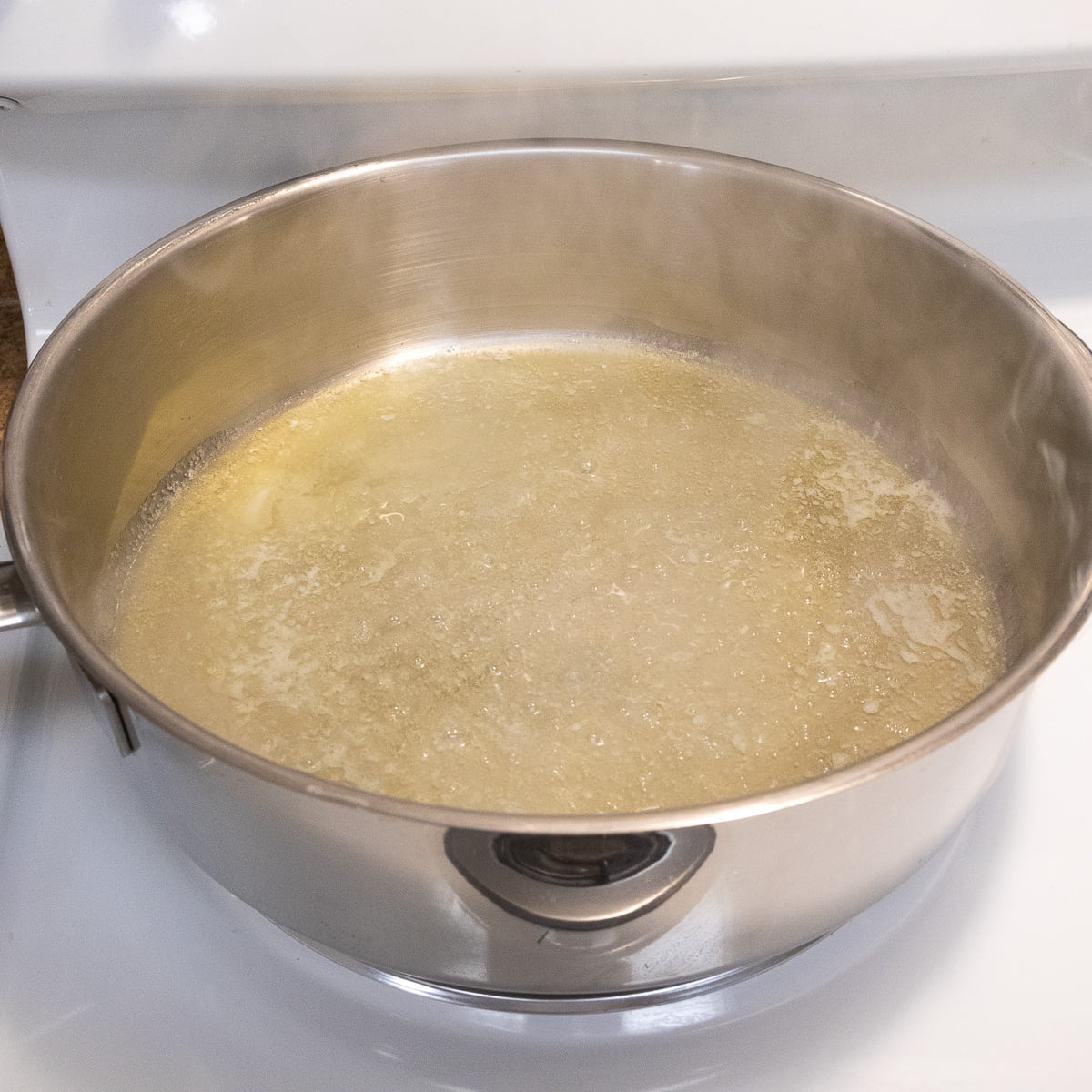 Butter melted in pan