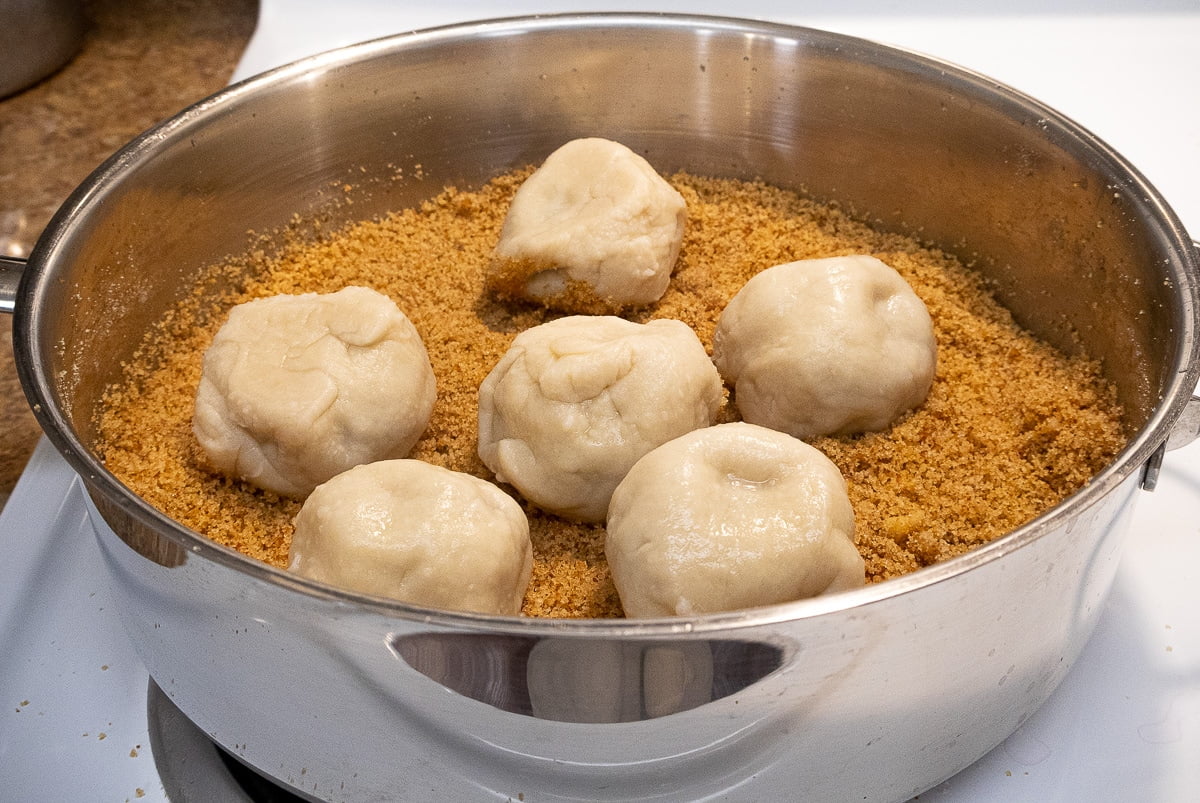Cooked plum dumplings in breadcrumbs