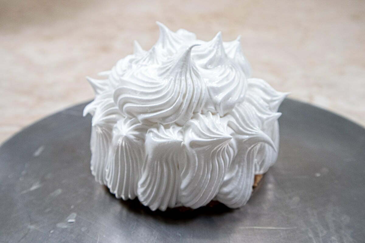 Meringue piped on top of ice cream