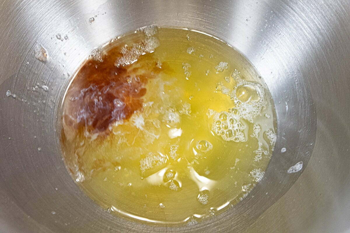 Egg whites and flavorings in mixing bowl for Angel Food Cake