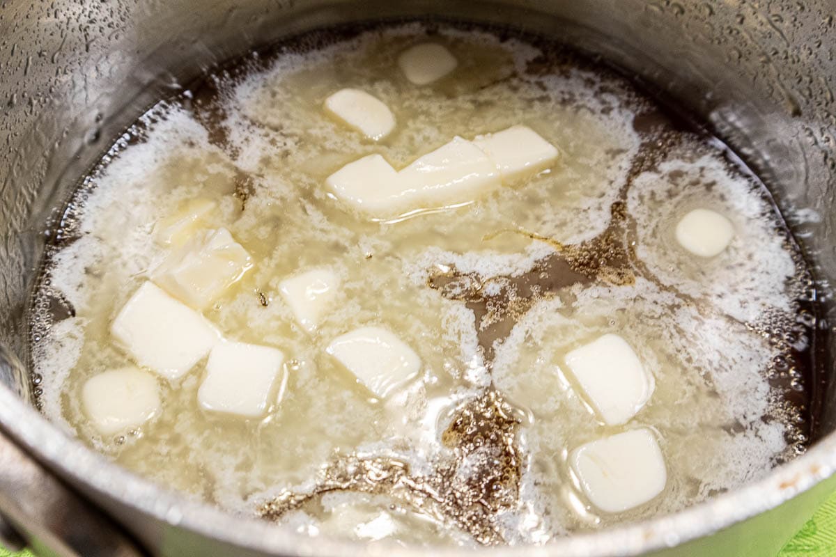 Butter is added to the hot golden syrup