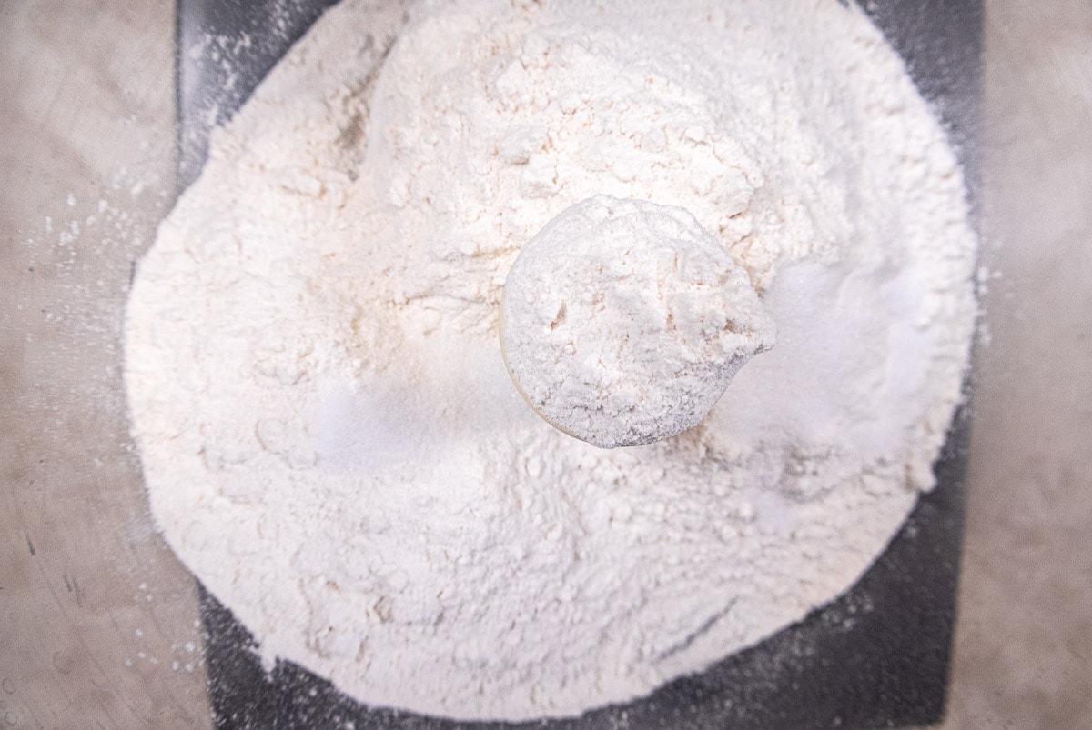 All-purpose flour,salt and ammonium carbonate or baking powder are placed in the bowl of a food processor
