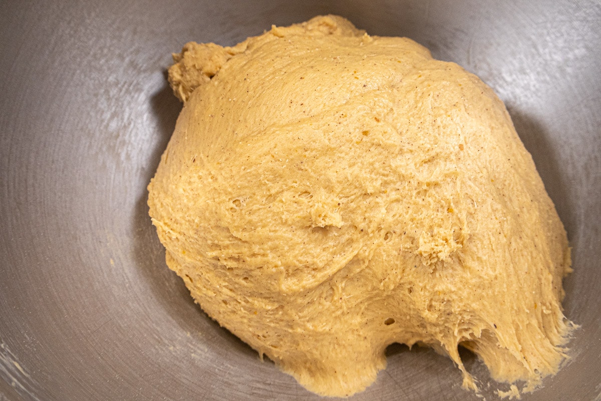 Pumpkin Dinner Roll dough completely mixed in bowl.  